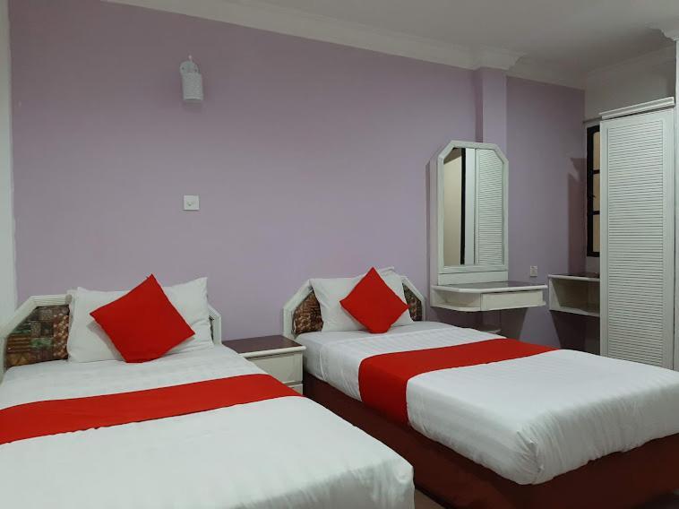 G City Hotel Телук-Интан Экстерьер фото